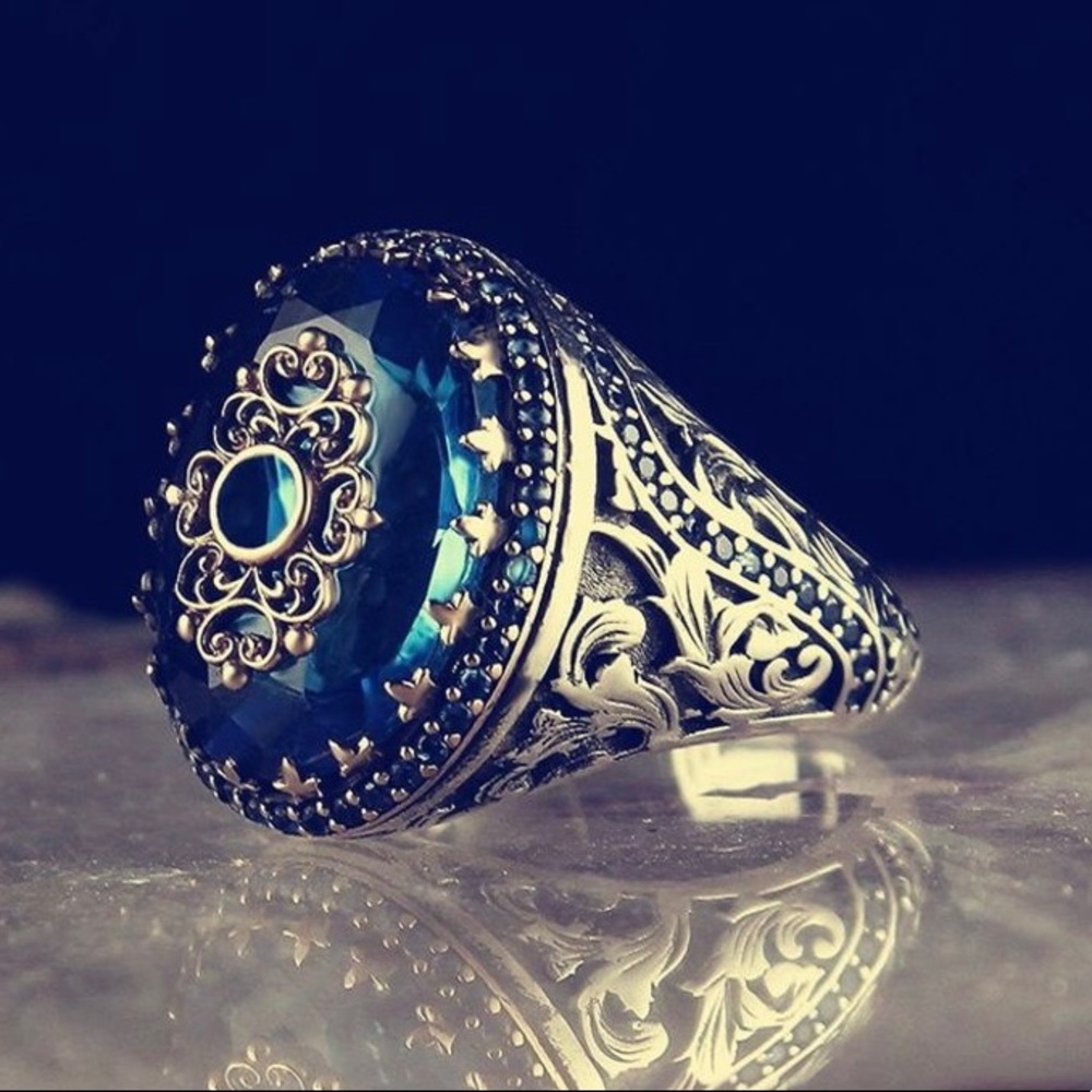 NWOT Silver Ring with diamond cut Blue Zircon Artisan designed stone! Wow